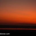 Pe dawn light reflected in Lake Ndutu